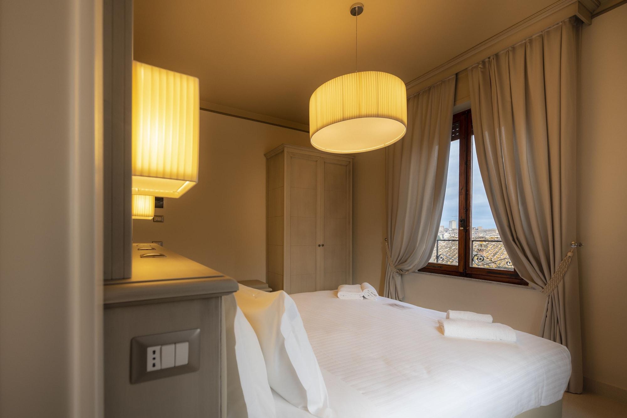 Villa Elda Boutique Hotel Siena Bagian luar foto
