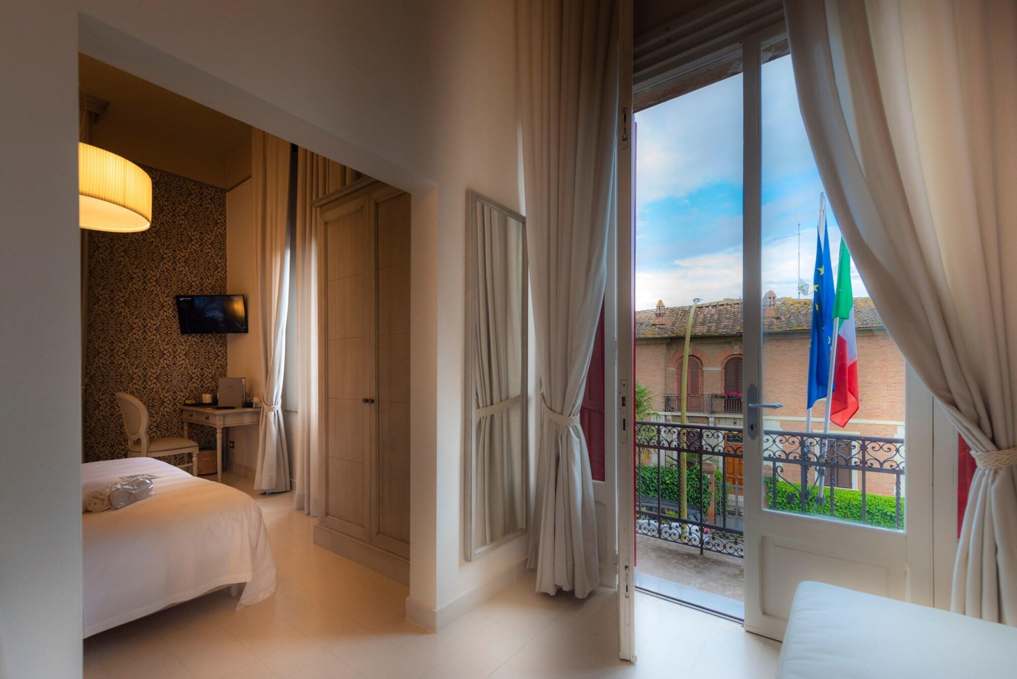 Villa Elda Boutique Hotel Siena Bagian luar foto