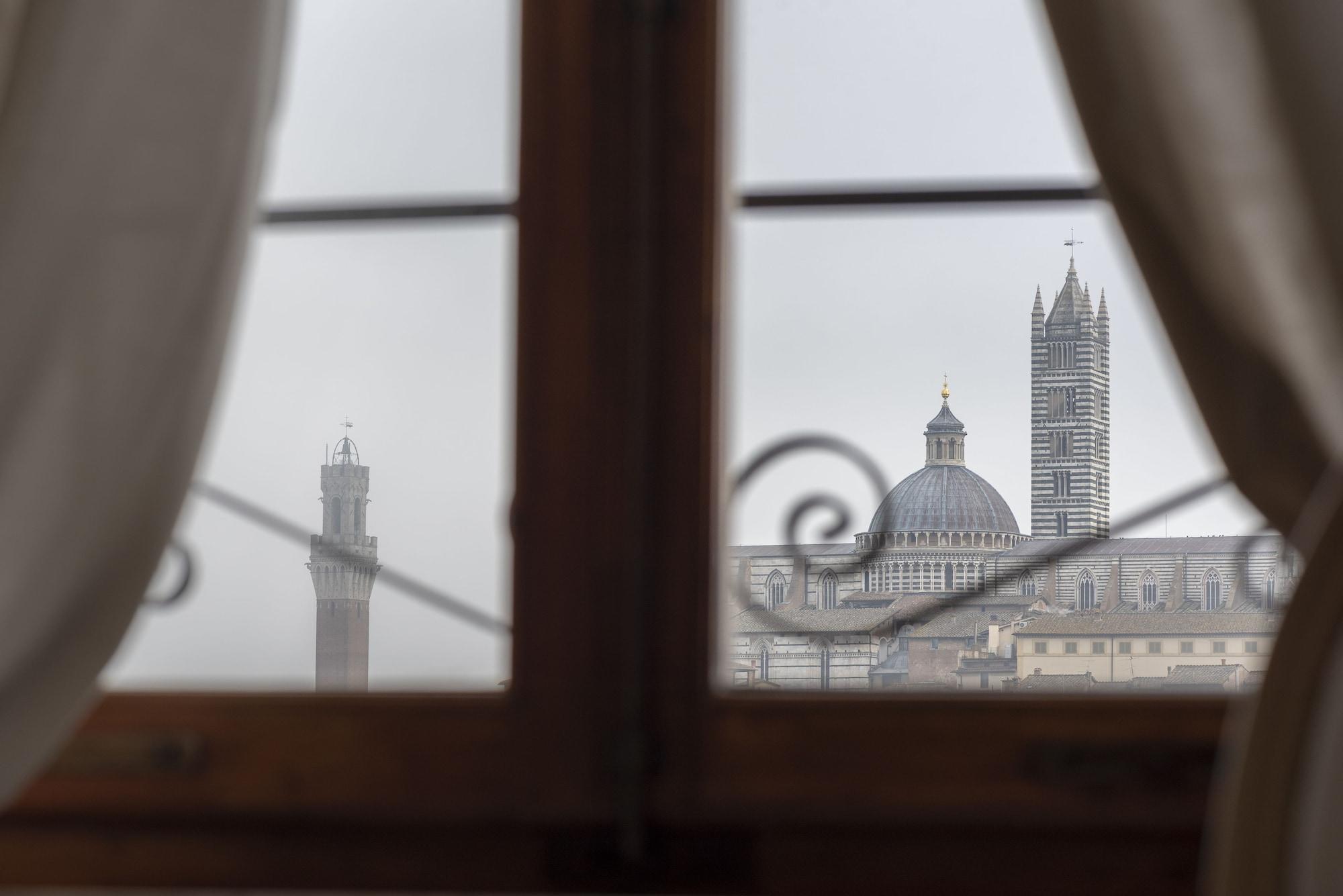 Villa Elda Boutique Hotel Siena Bagian luar foto