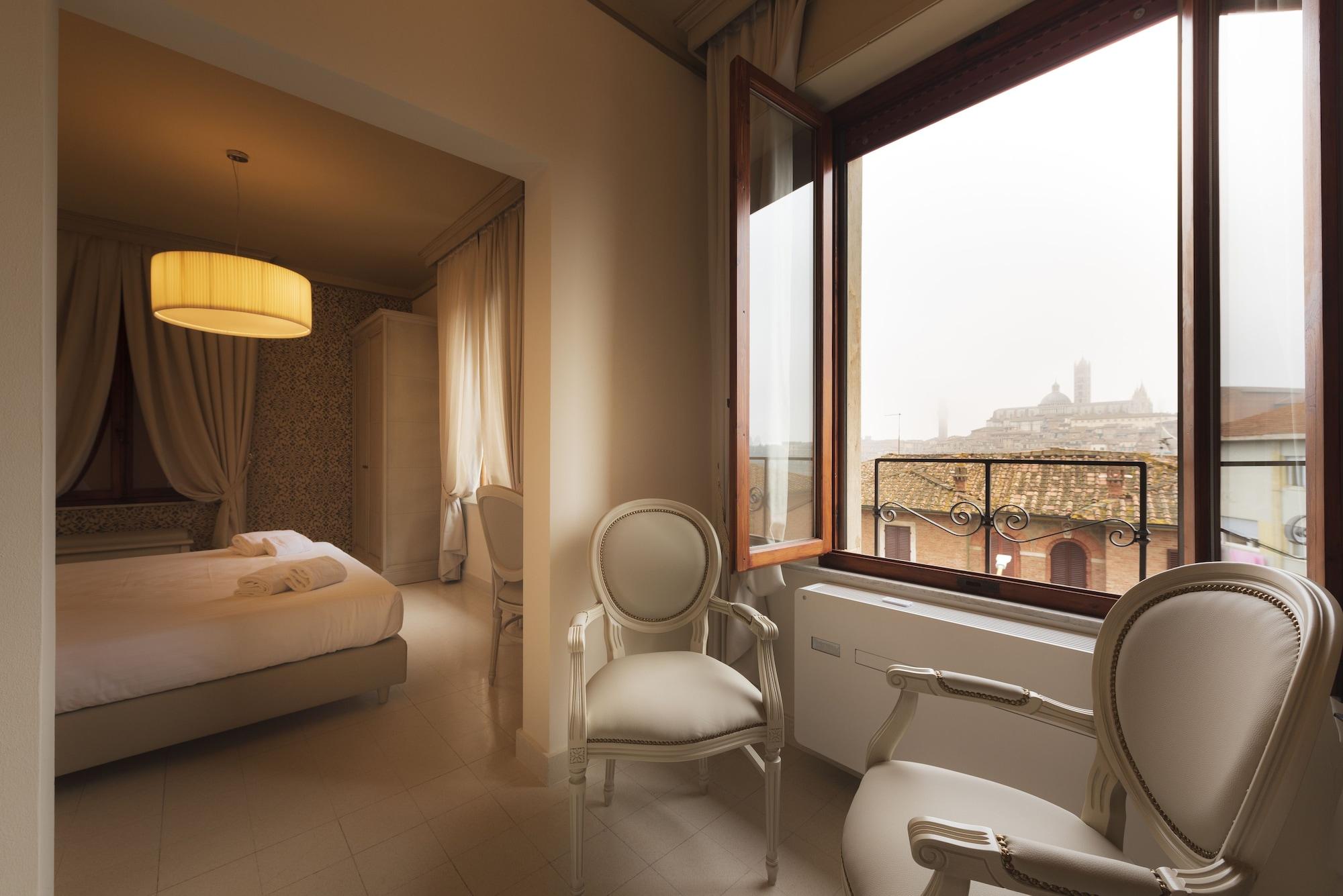 Villa Elda Boutique Hotel Siena Bagian luar foto
