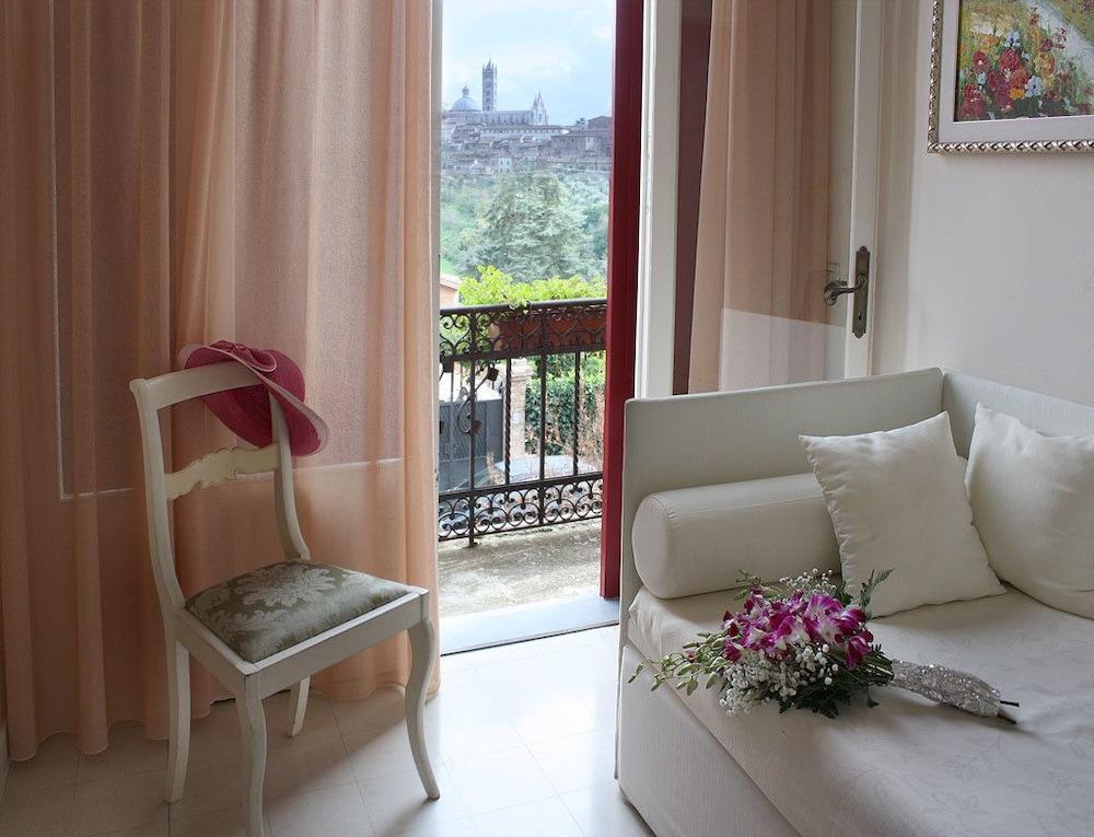 Villa Elda Boutique Hotel Siena Bagian luar foto